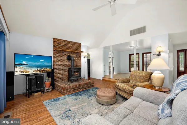a kitchen with stainless steel appliances a sink stove and refrigerator