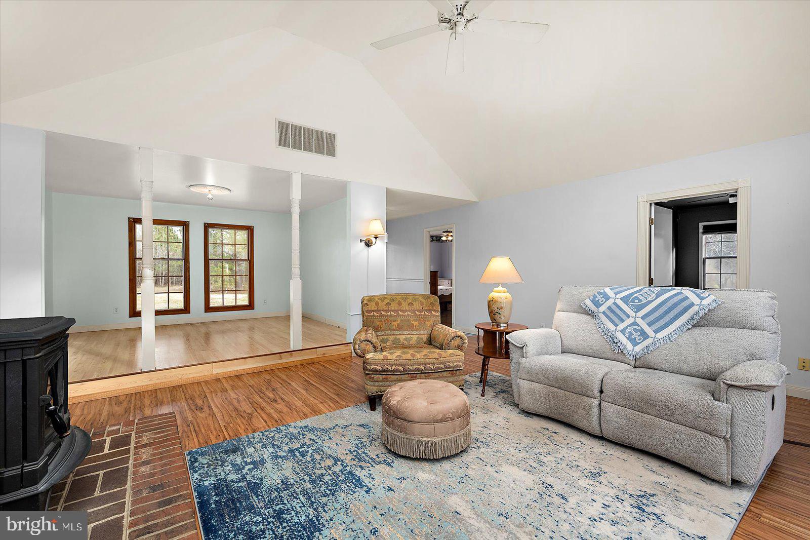 9554 Millard Long Road Westover, MD 21871 - Photo 9 of 69 a living room with furniture and a fireplace