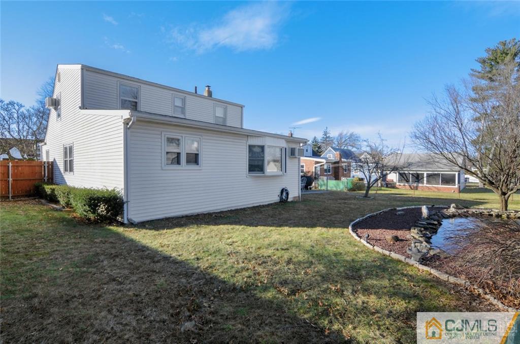 136 McFarlane Road Colonia, NJ 07067 - Photo 23 of 23 a view of a backyard with a garden
