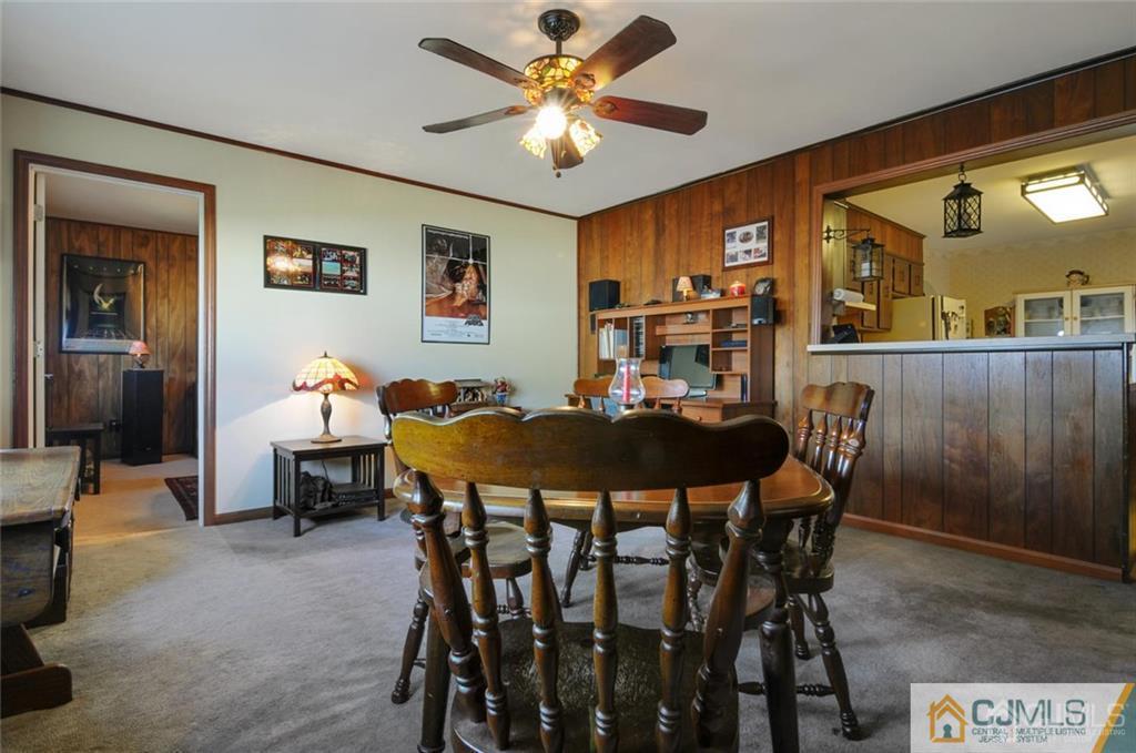 136 McFarlane Road Colonia, NJ 07067 - Photo 8 of 23 a view of a dining room with furniture