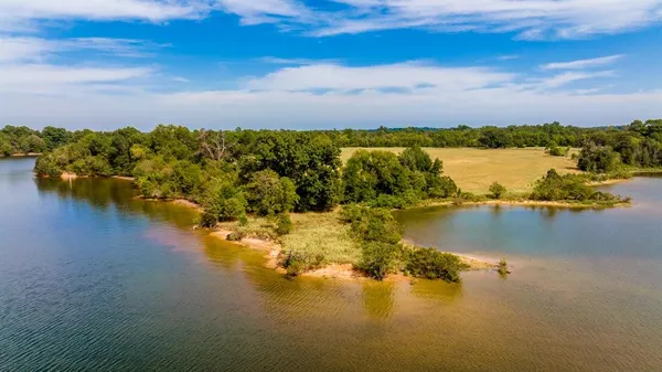 a view of an ocean with beach