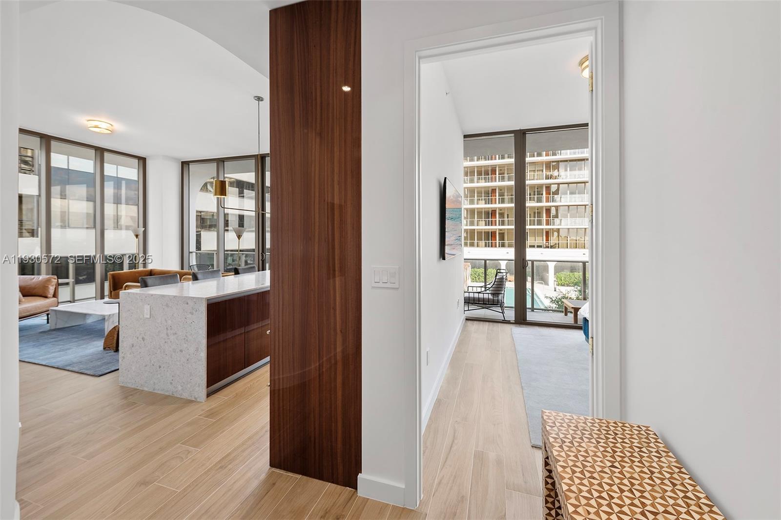 2655 South Bayshore Drive, Unit 909 Miami, FL 33133 - Photo 11 of 26 a bathroom with a tub shower and sink