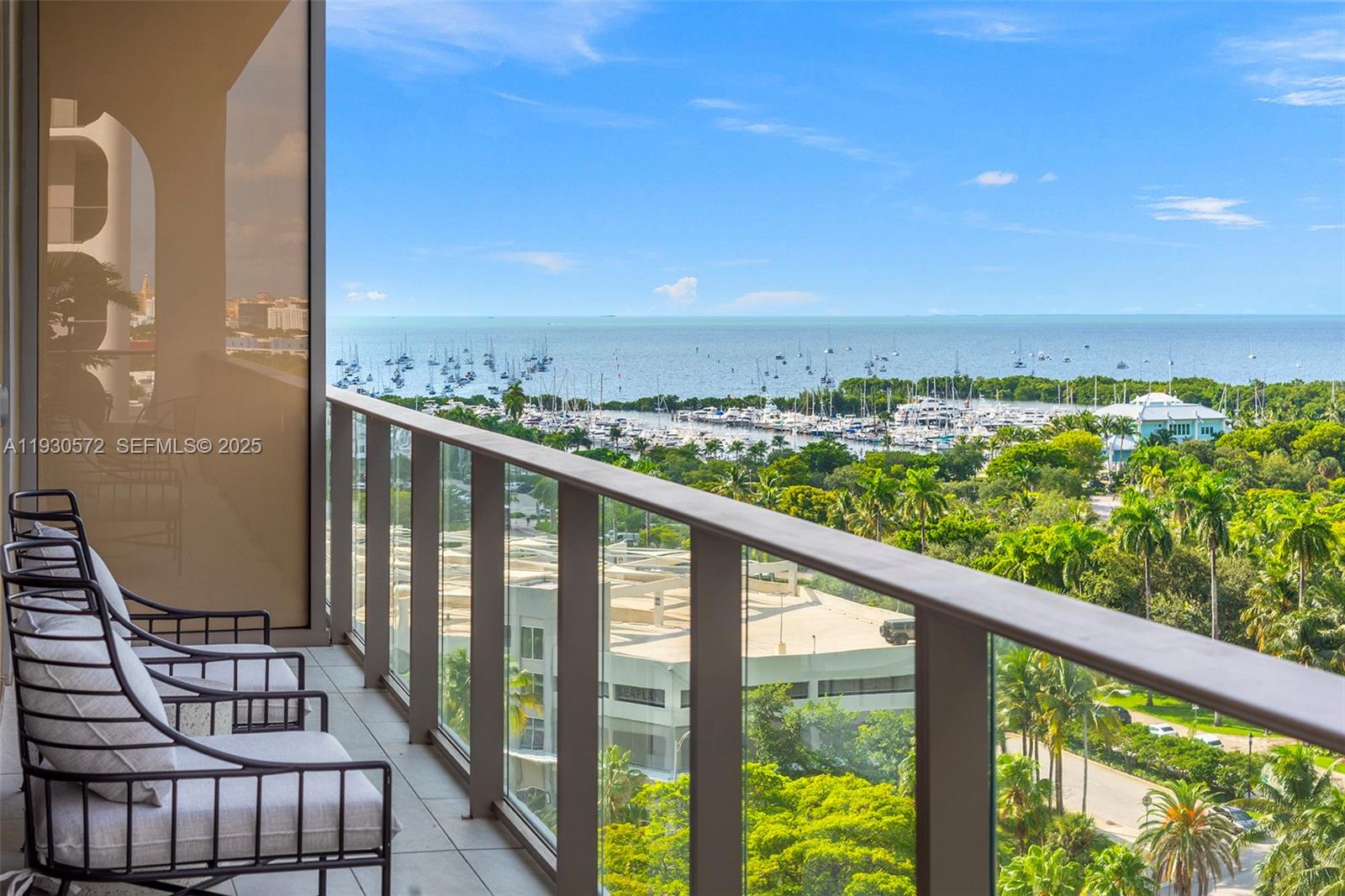 2655 South Bayshore Drive, Unit 909 Miami, FL 33133 - Photo 18 of 26 a view of city from balcony