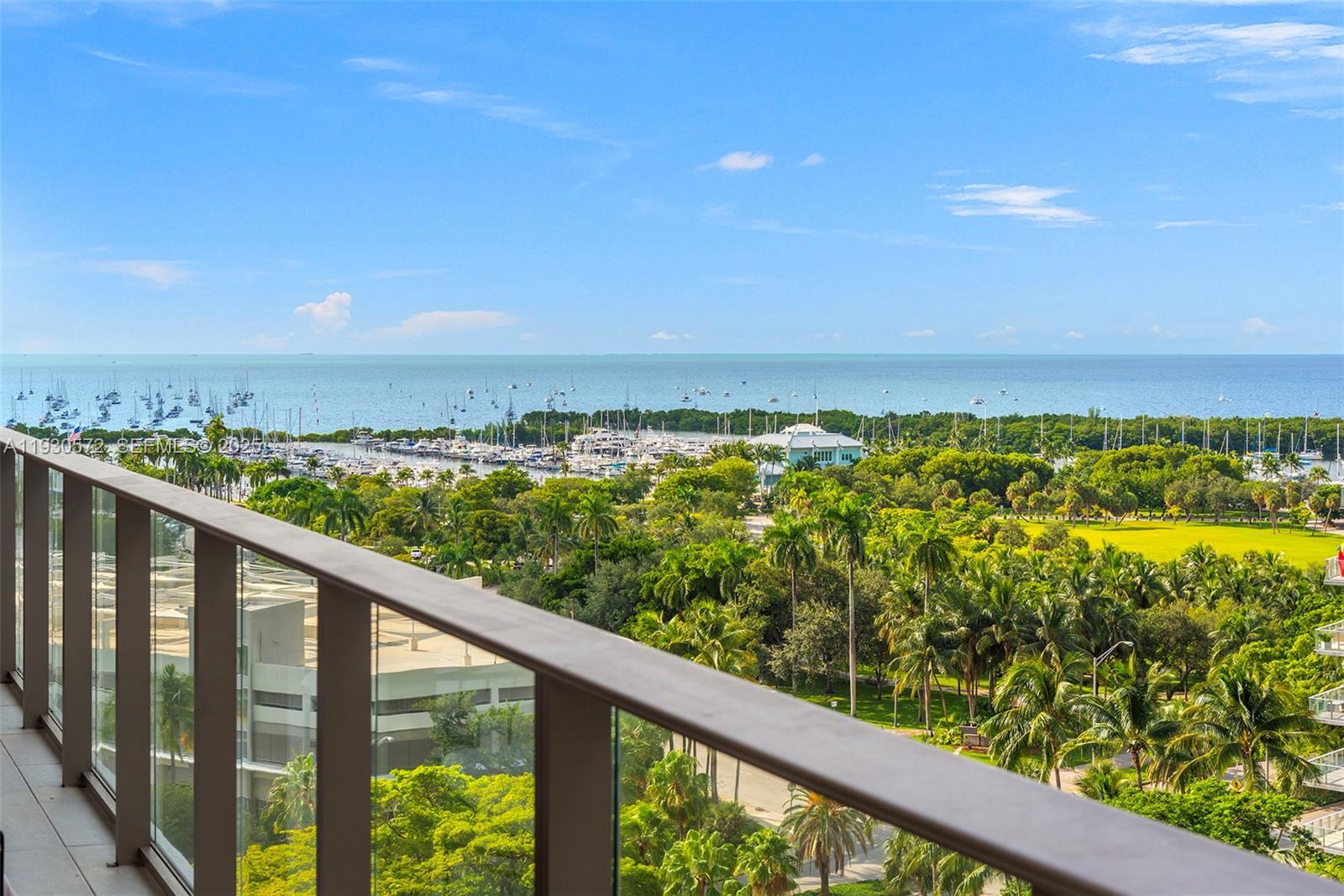 2655 South Bayshore Drive, Unit 909 Miami, FL 33133 - Photo 26 of 26 a city view from a balcony