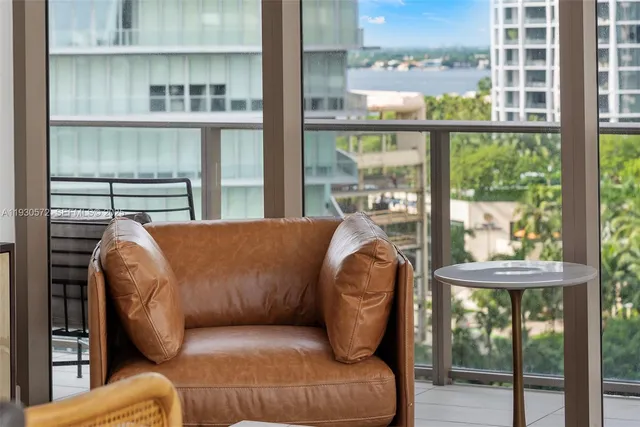 a view of a balcony with a potted plant
