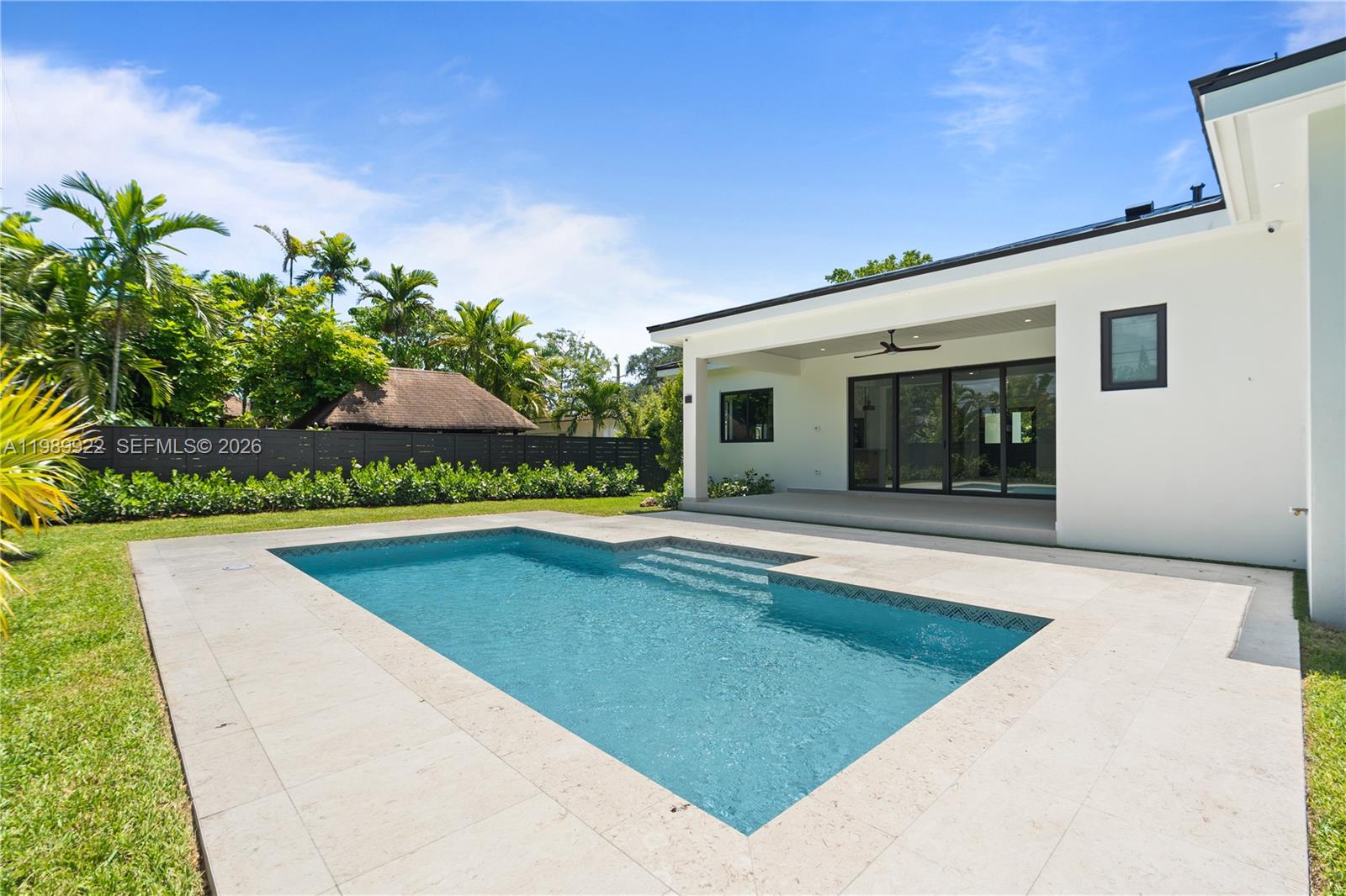 6221 Southwest 60th Street South Miami, FL 33143 - Photo 42 of 42 a view of a house with swimming pool and sitting area