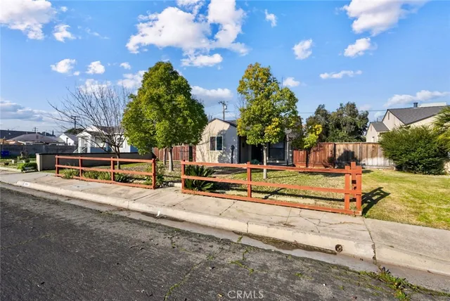 a view of a house with basketball court