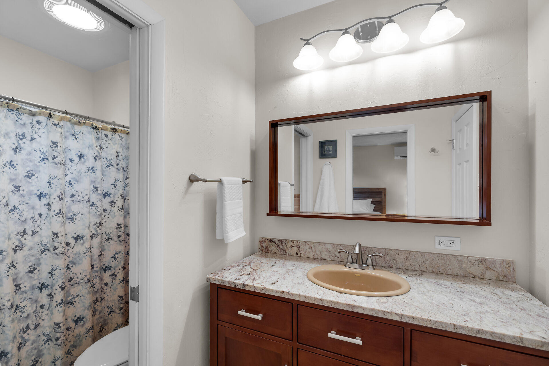 2801 Fogarty Avenue Key West, FL 33040 - Photo 5 of 53 a bathroom with a granite countertop sink a mirror and shower