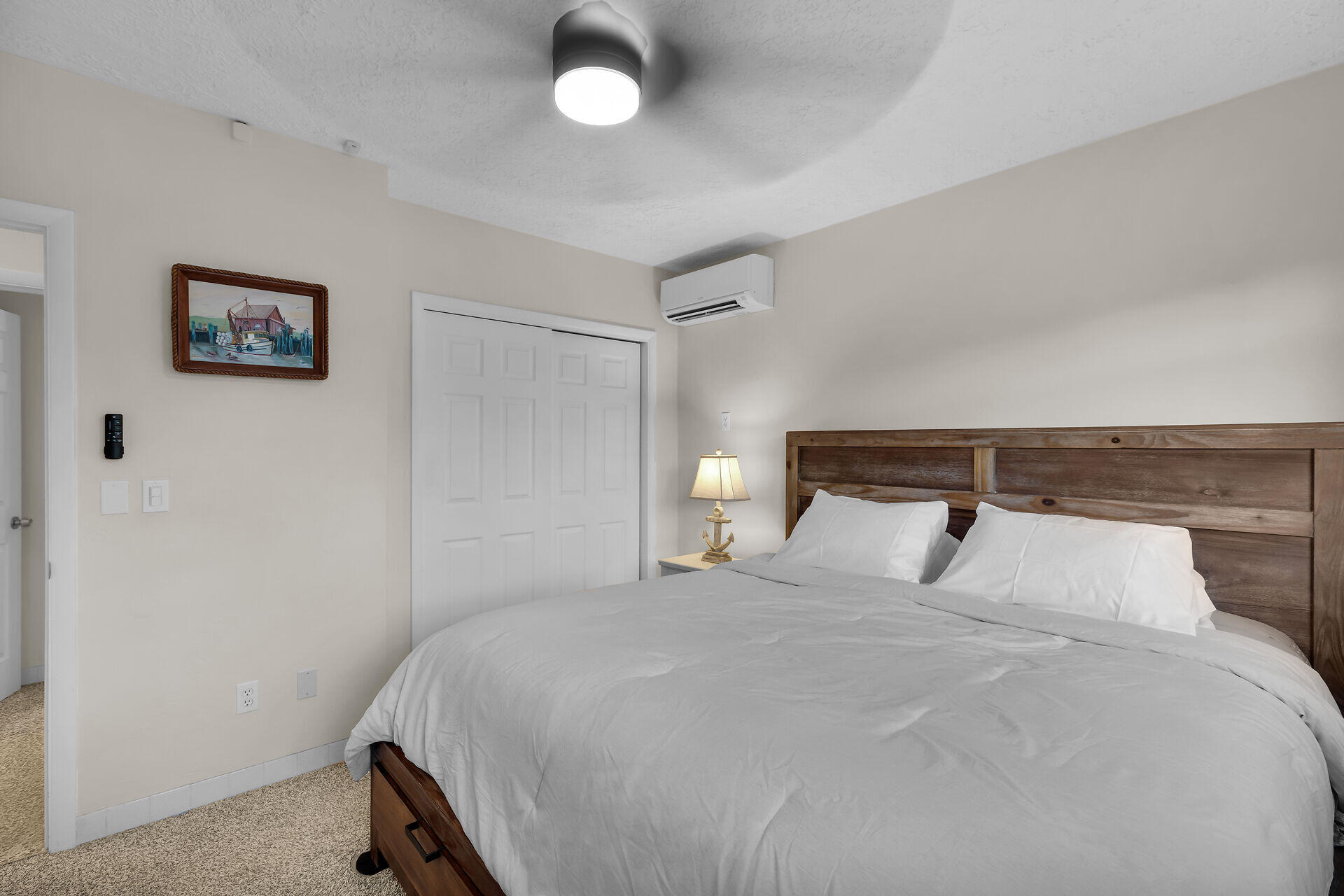 2801 Fogarty Avenue Key West, FL 33040 - Photo 6 of 53 a bedroom with a bed and a painting on the wall