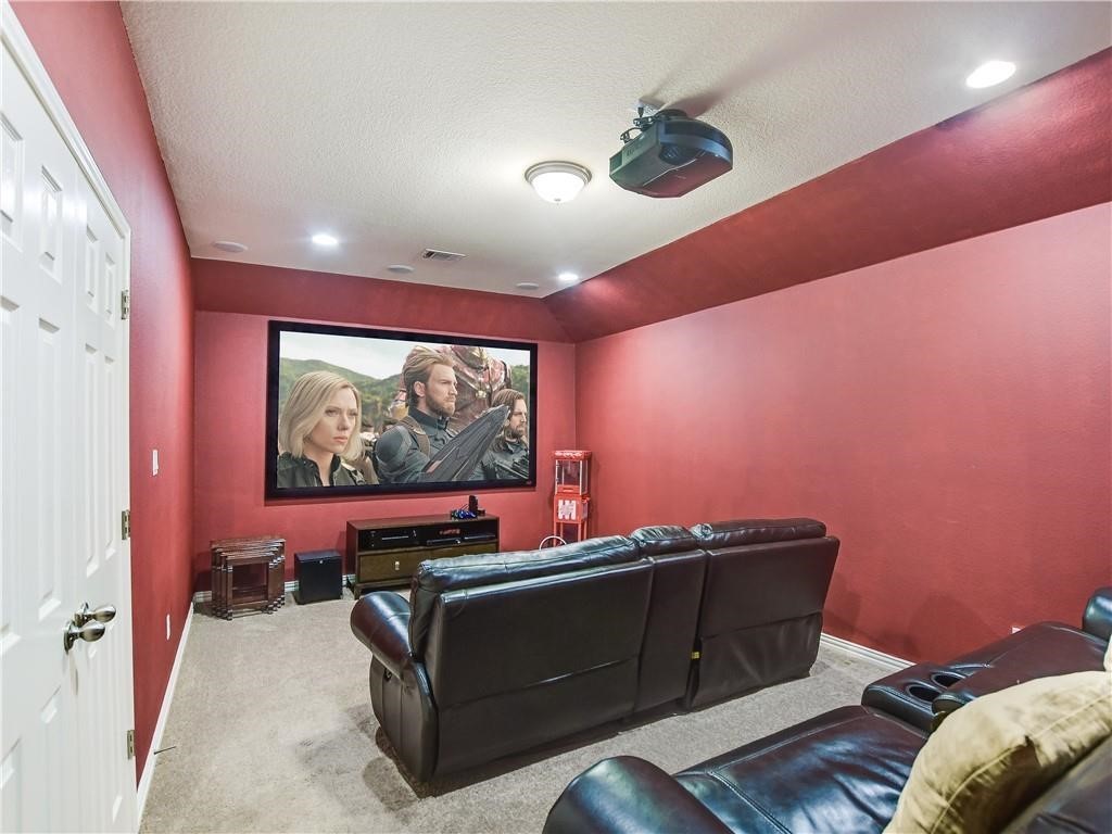 137 Nantucket Circle Austin, TX 78737 - Photo 14 of 34 a living room with furniture and a flat screen tv