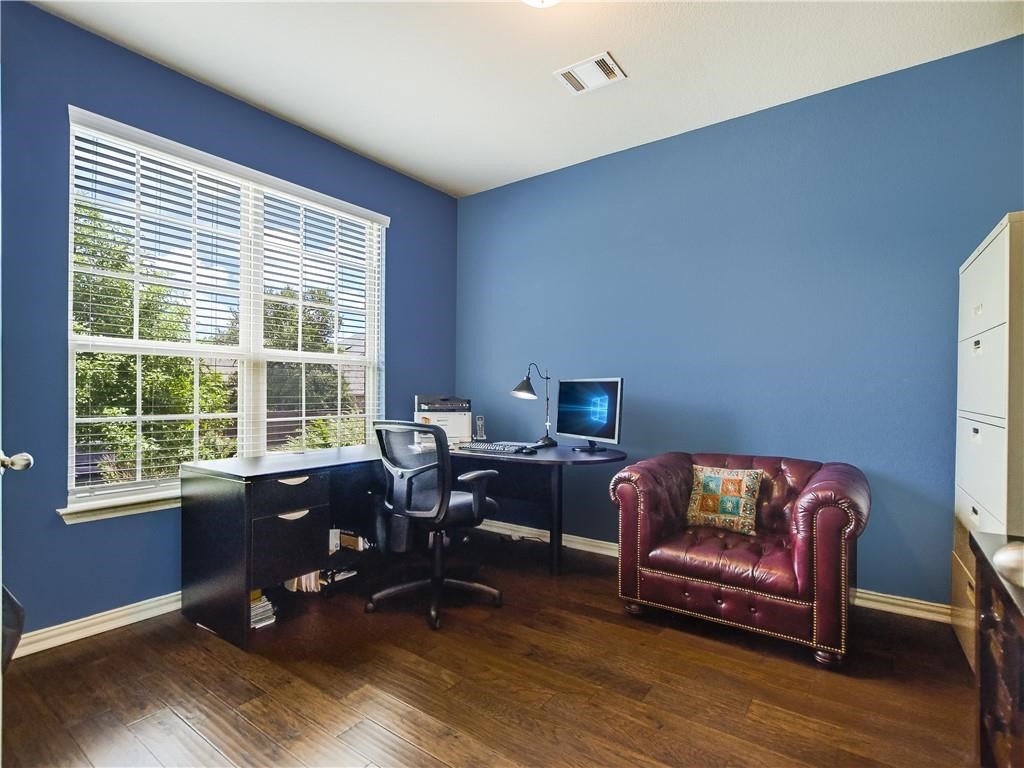 137 Nantucket Circle Austin, TX 78737 - Photo 15 of 34 a workspace with furniture and a window