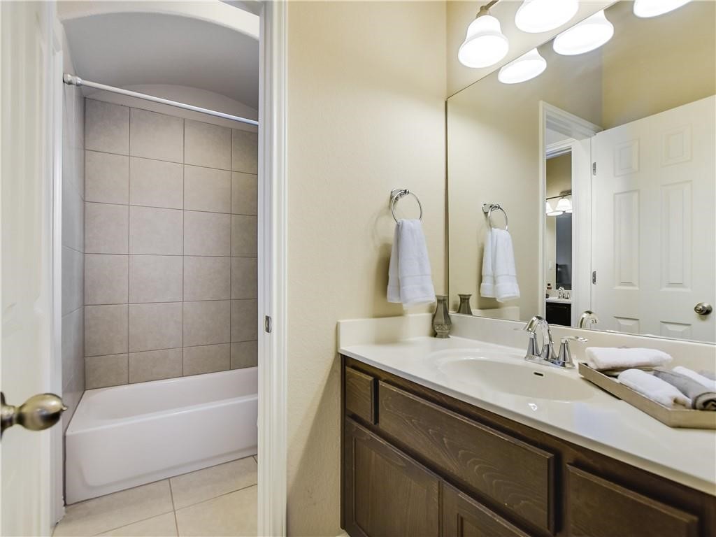 137 Nantucket Circle Austin, TX 78737 - Photo 22 of 34 a bathroom with a sink and a mirror