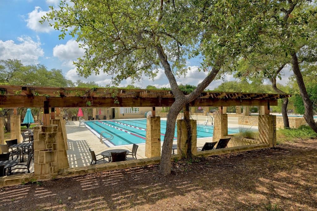 137 Nantucket Circle Austin, TX 78737 - Photo 29 of 34 a view of a house with a yard