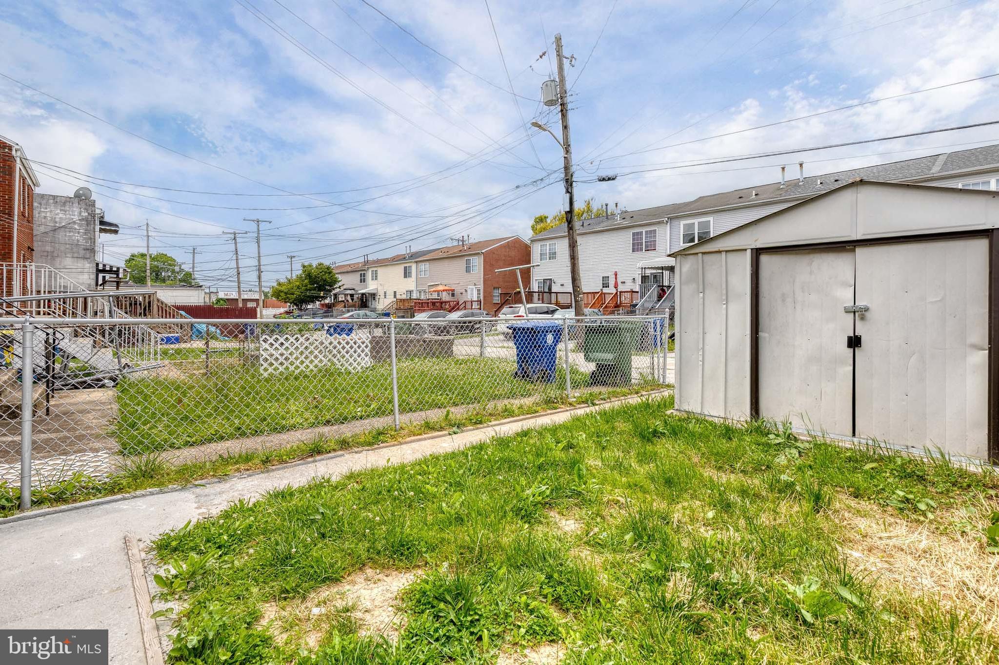 2708 Uhler Avenue Baltimore, MD 21215 - Photo 18 of 18 a view of a house with backyard and porch