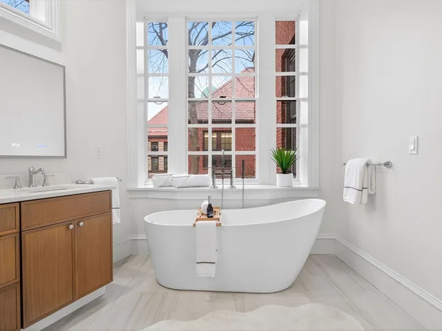 a view of a bath tub sitting in a bathroom