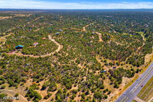3654 Zane Grey Trail, Unit 59 Overgaard, AZ 85933 - Photo 9 of 9 a view of a city with an outdoor space