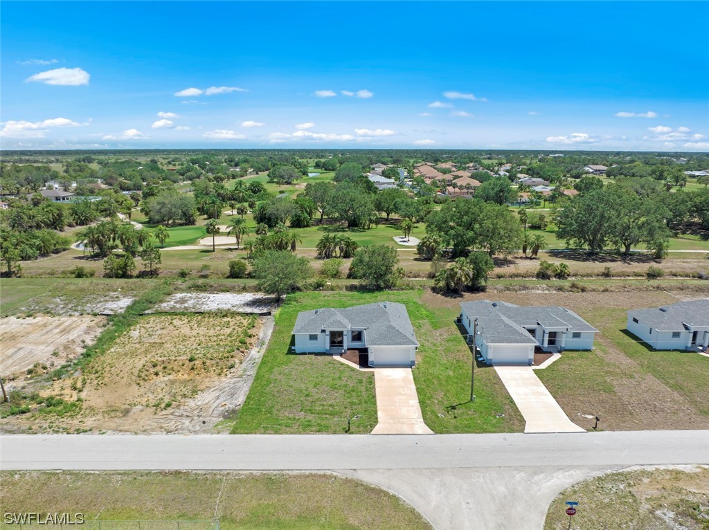 367 Ranier Avenue Lehigh Acres, FL 33974 - Photo 3 of 24 a view of a city