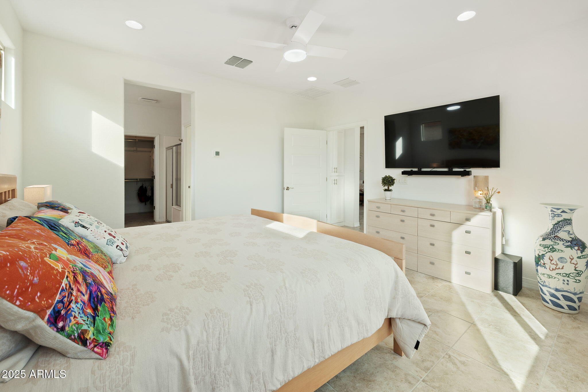 5823 South Del Rancho Mesa, AZ 85212 - Photo 27 of 67 a bedroom with a bed and a flat screen tv