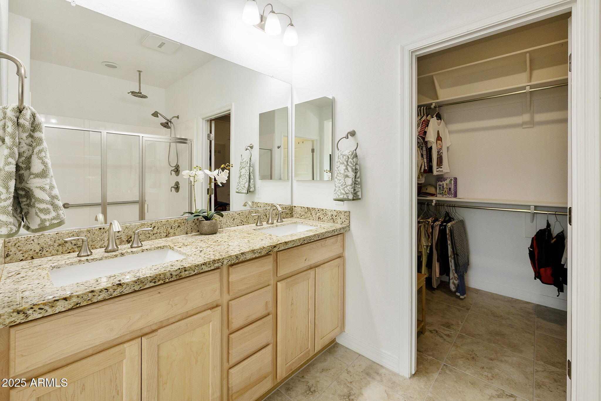 5823 South Del Rancho Mesa, AZ 85212 - Photo 30 of 67 a bathroom with a granite countertop sink and a mirror