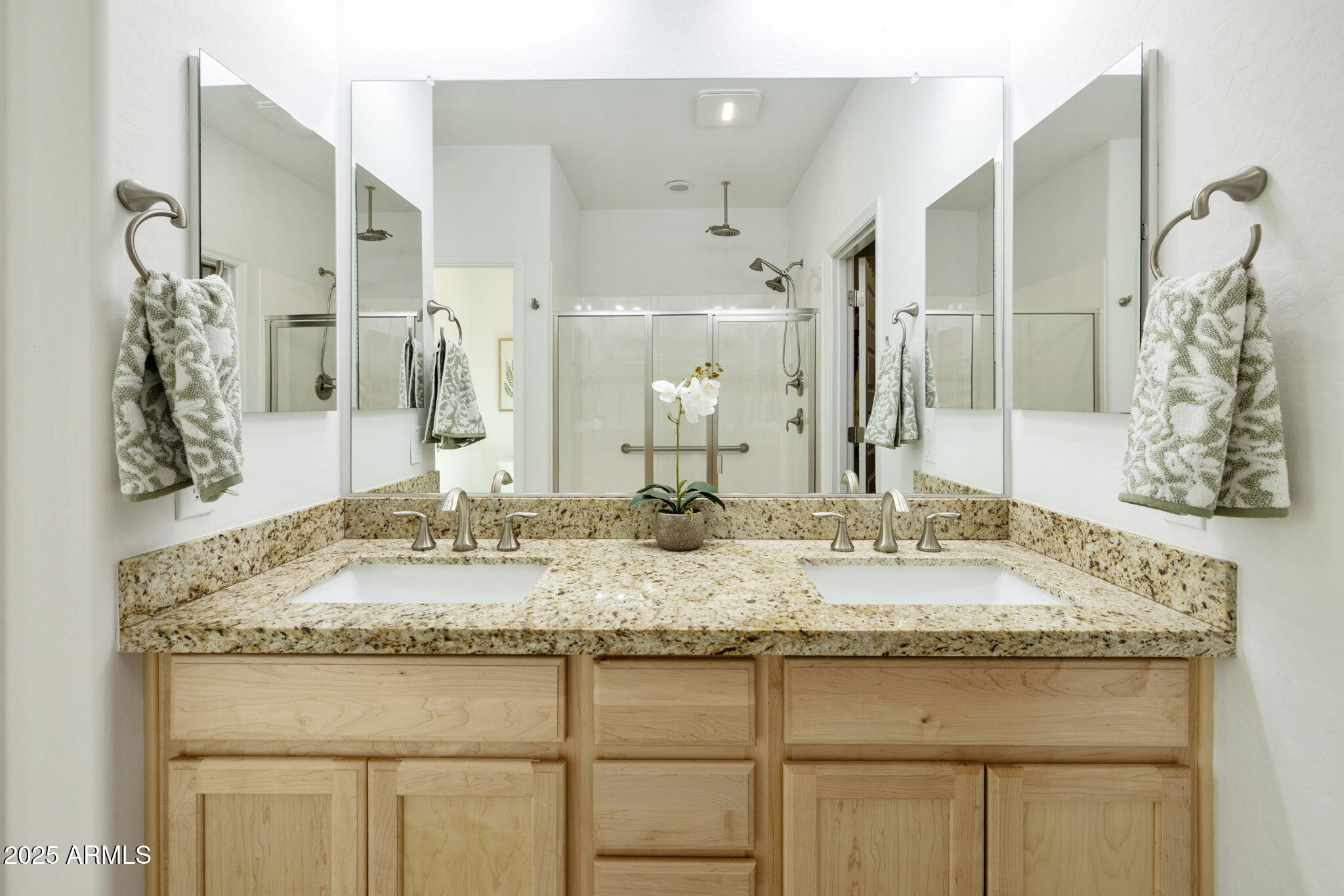 5823 South Del Rancho Mesa, AZ 85212 - Photo 32 of 67 a bathroom with a granite countertop sink and a mirror