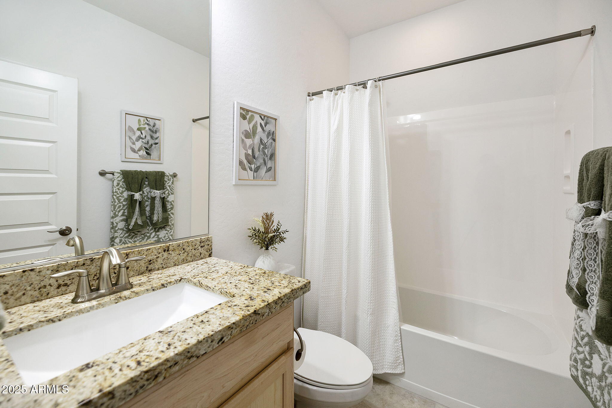 5823 South Del Rancho Mesa, AZ 85212 - Photo 35 of 67 a bathroom with a granite countertop sink a toilet and shower