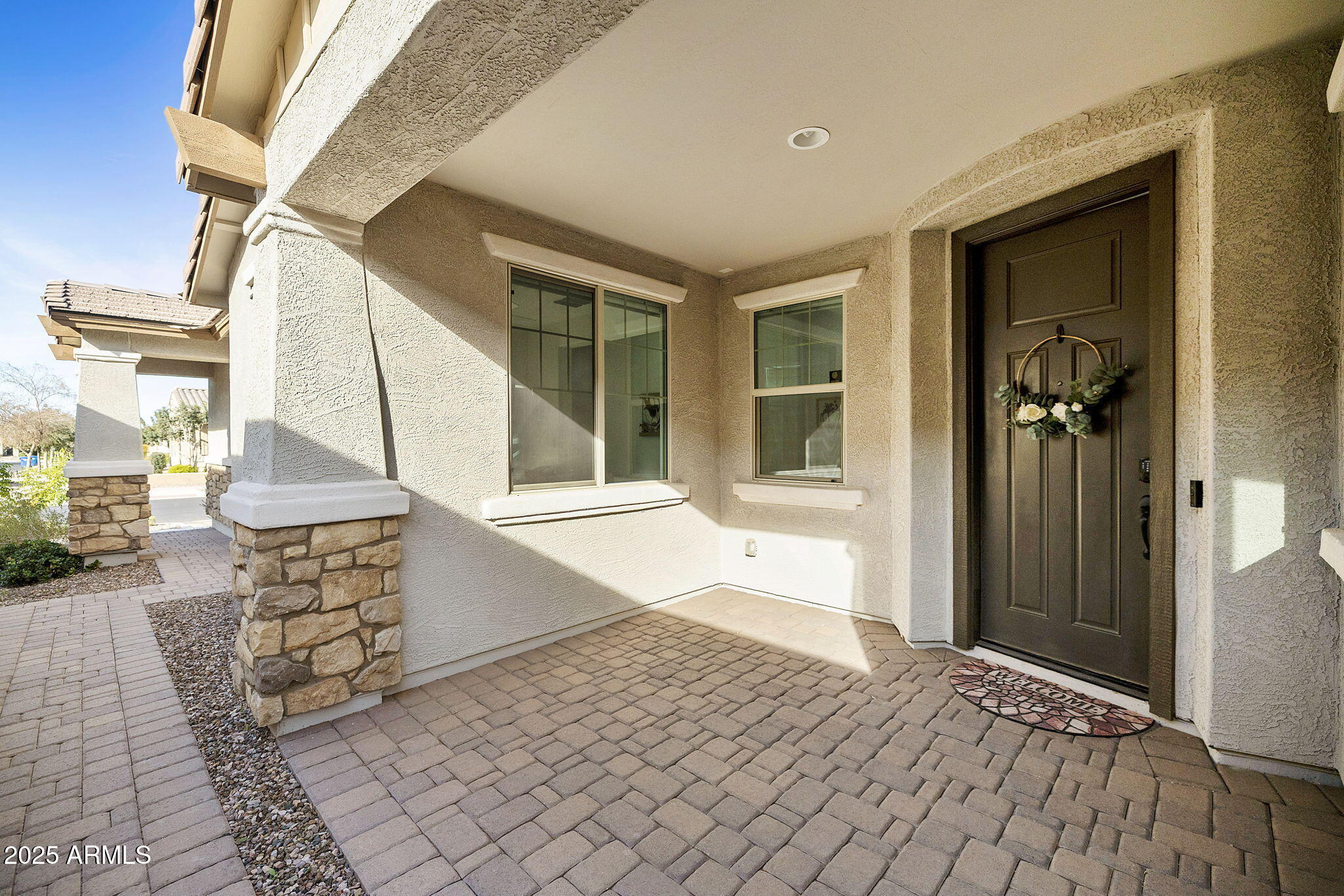 5823 South Del Rancho Mesa, AZ 85212 - Photo 4 of 67 a view of an entryway with wooden floor and a yard