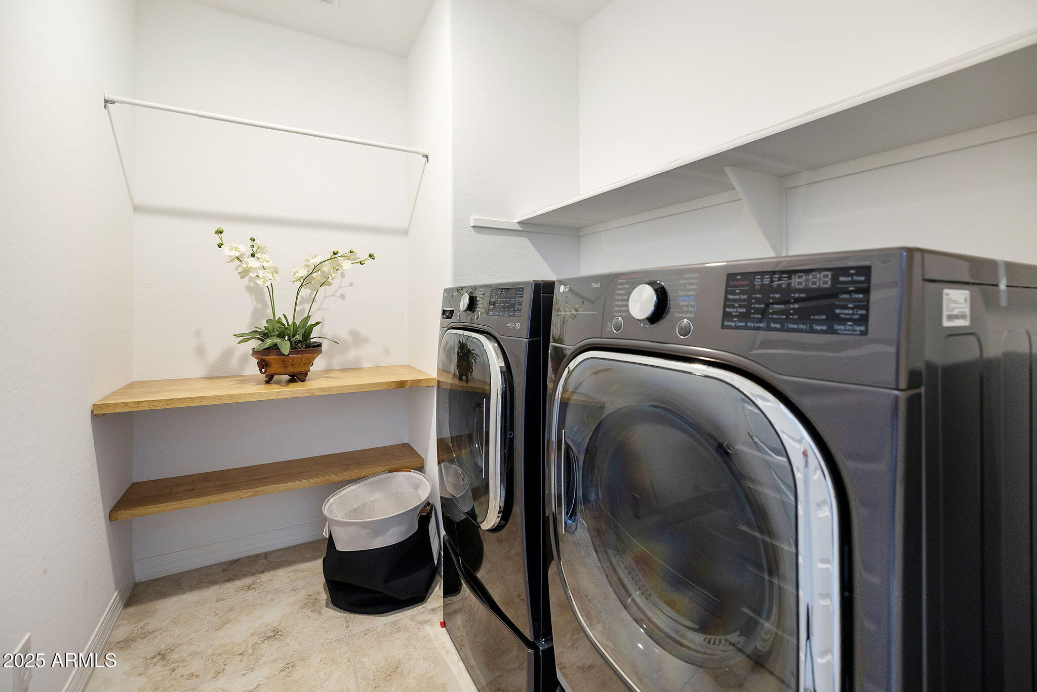 5823 South Del Rancho Mesa, AZ 85212 - Photo 41 of 67 a room with a washer and dryer