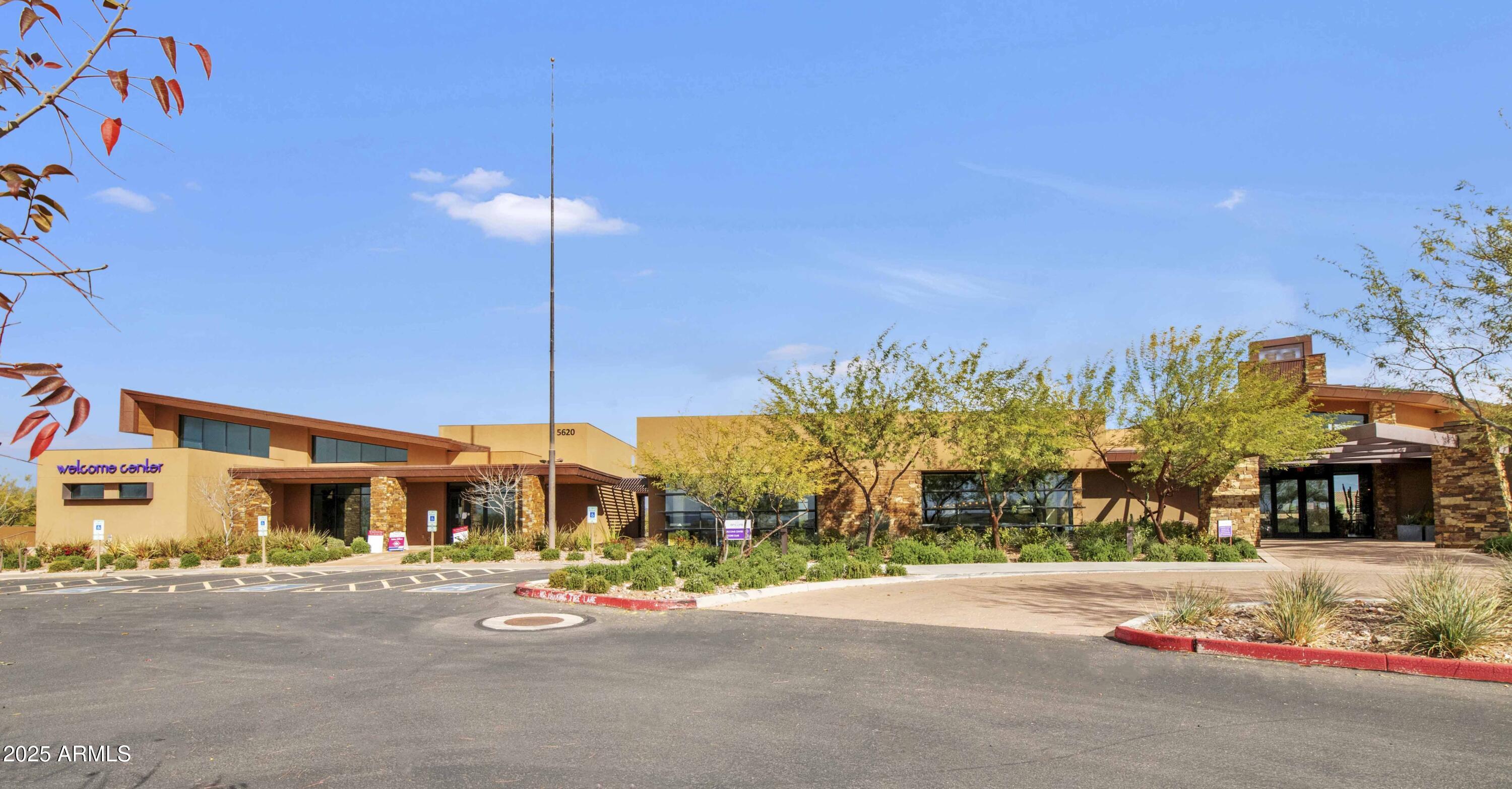 5823 South Del Rancho Mesa, AZ 85212 - Photo 51 of 67 a car parked in front of a building