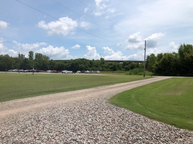 0 Ali Grace Lane Adamsville, TN 38310 - Photo 8 of 11 a view of a lake with a big yard