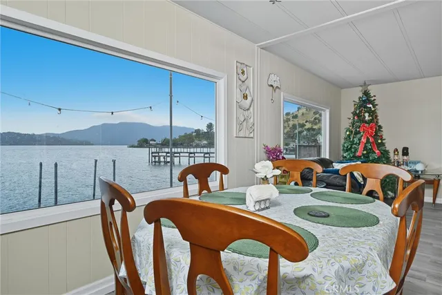 a group of chairs sitting in a kitchen next to a window