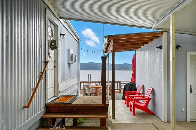 an outdoor sitting area with furniture