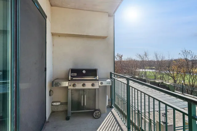 a view of a balcony with an outdoor space
