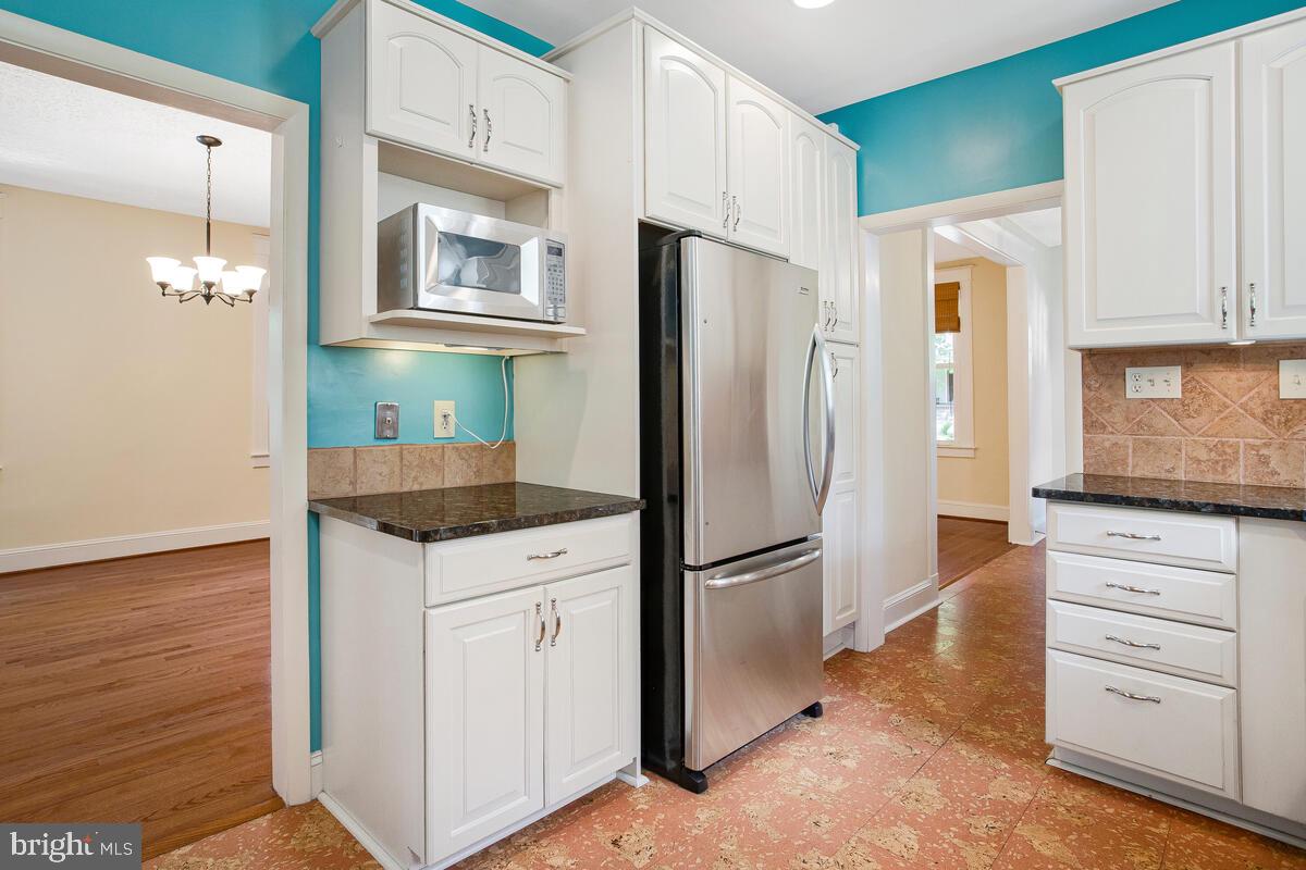 409 Woodford Road Baltimore, MD 21212 - Photo 15 of 49 Kitchen with stainless appliances