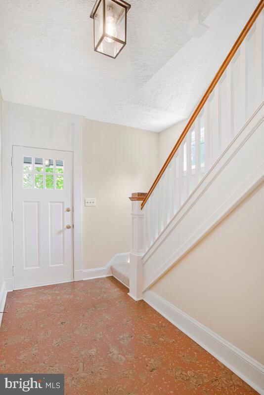 409 Woodford Road Baltimore, MD 21212 - Photo 25 of 49 High ceilings and cork flooring