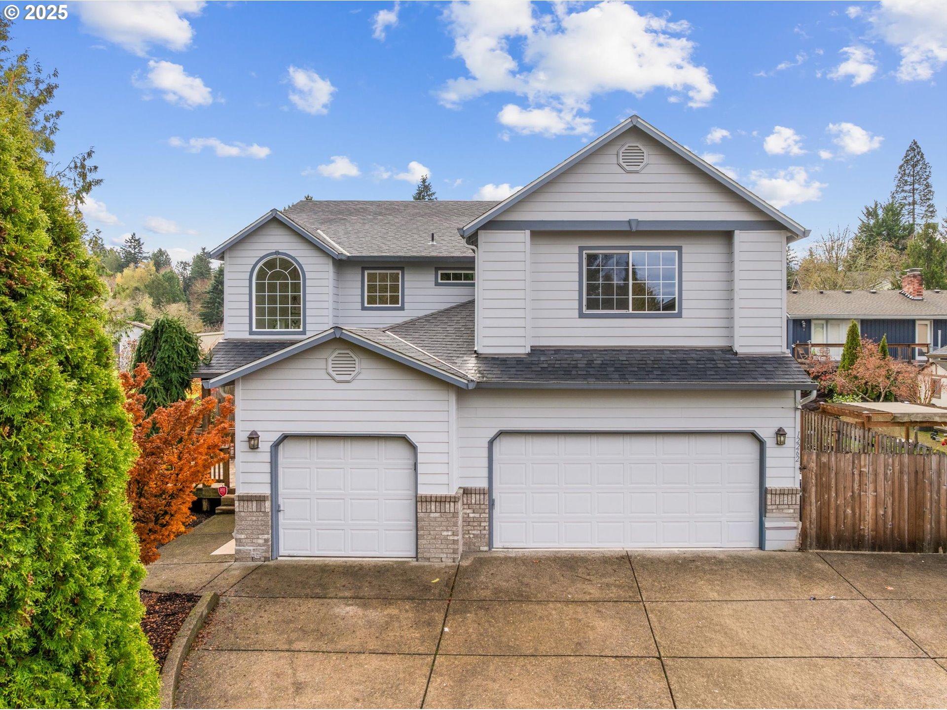 12262 Southwest 114th Terrace Portland, OR 97223 - Photo 1 of 41 a front view of a house with garage