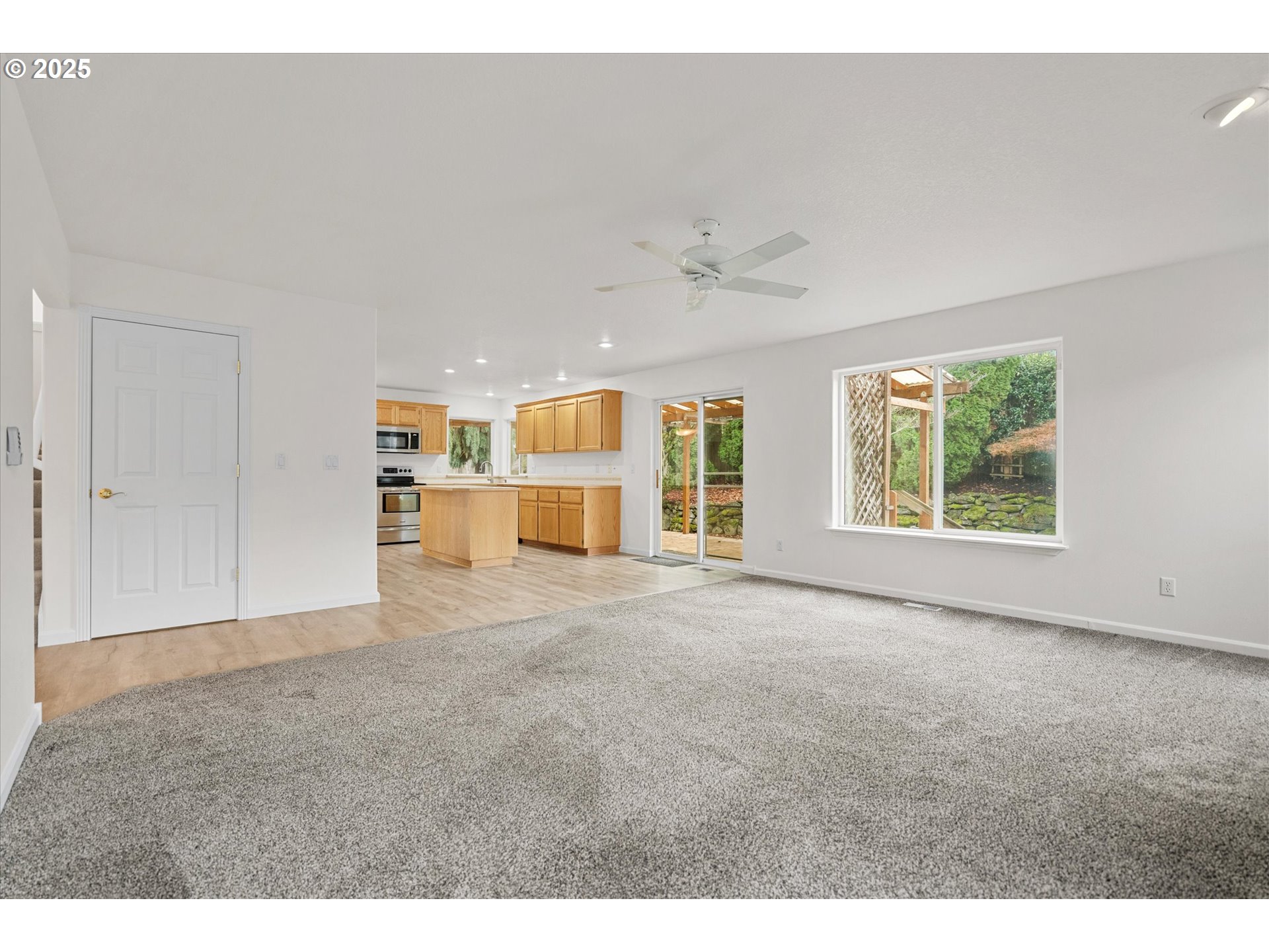 12262 Southwest 114th Terrace Portland, OR 97223 - Photo 14 of 41 a view of an empty room with a window