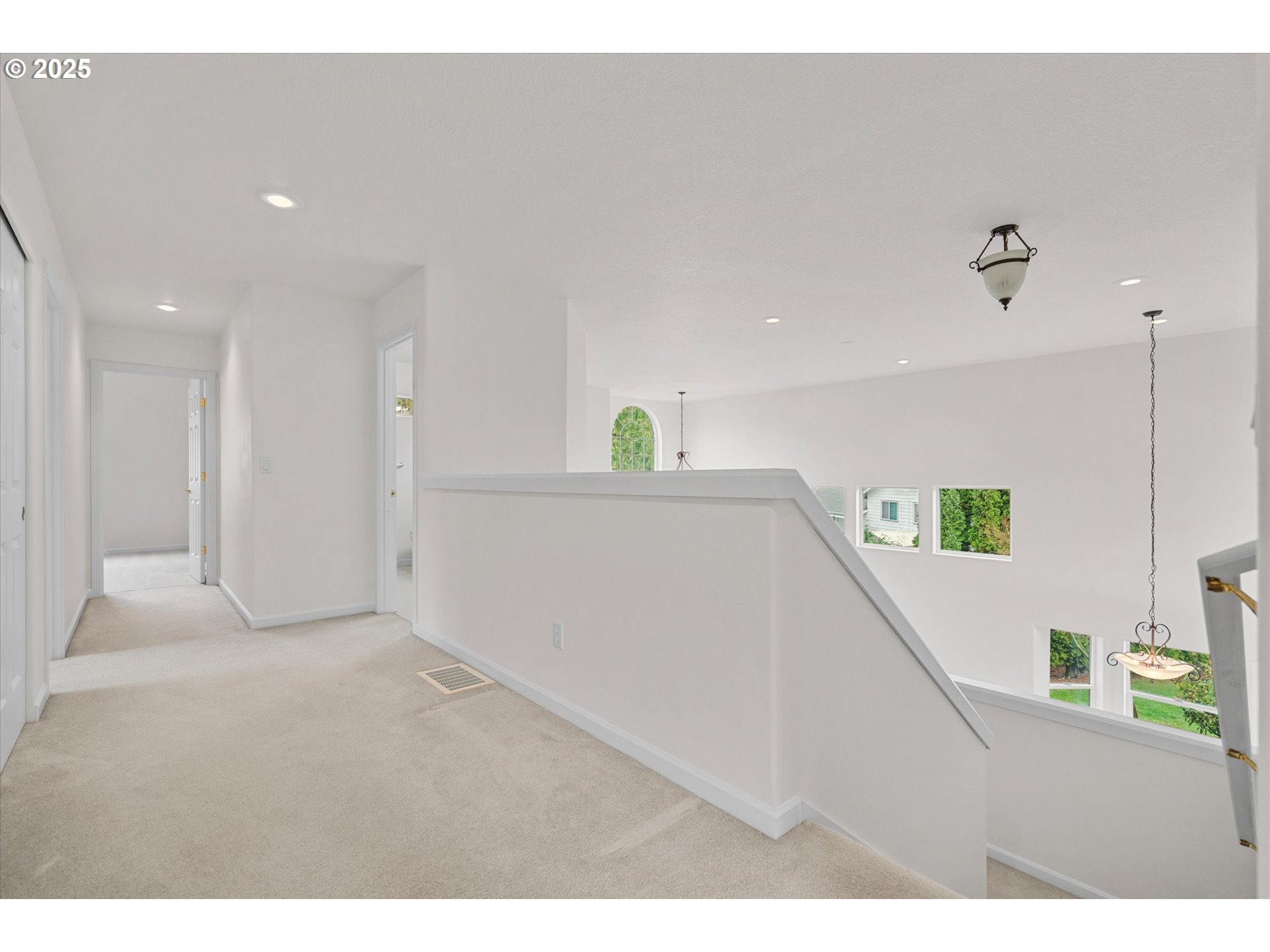 12262 Southwest 114th Terrace Portland, OR 97223 - Photo 21 of 41 a view of a hallway with a potted plant