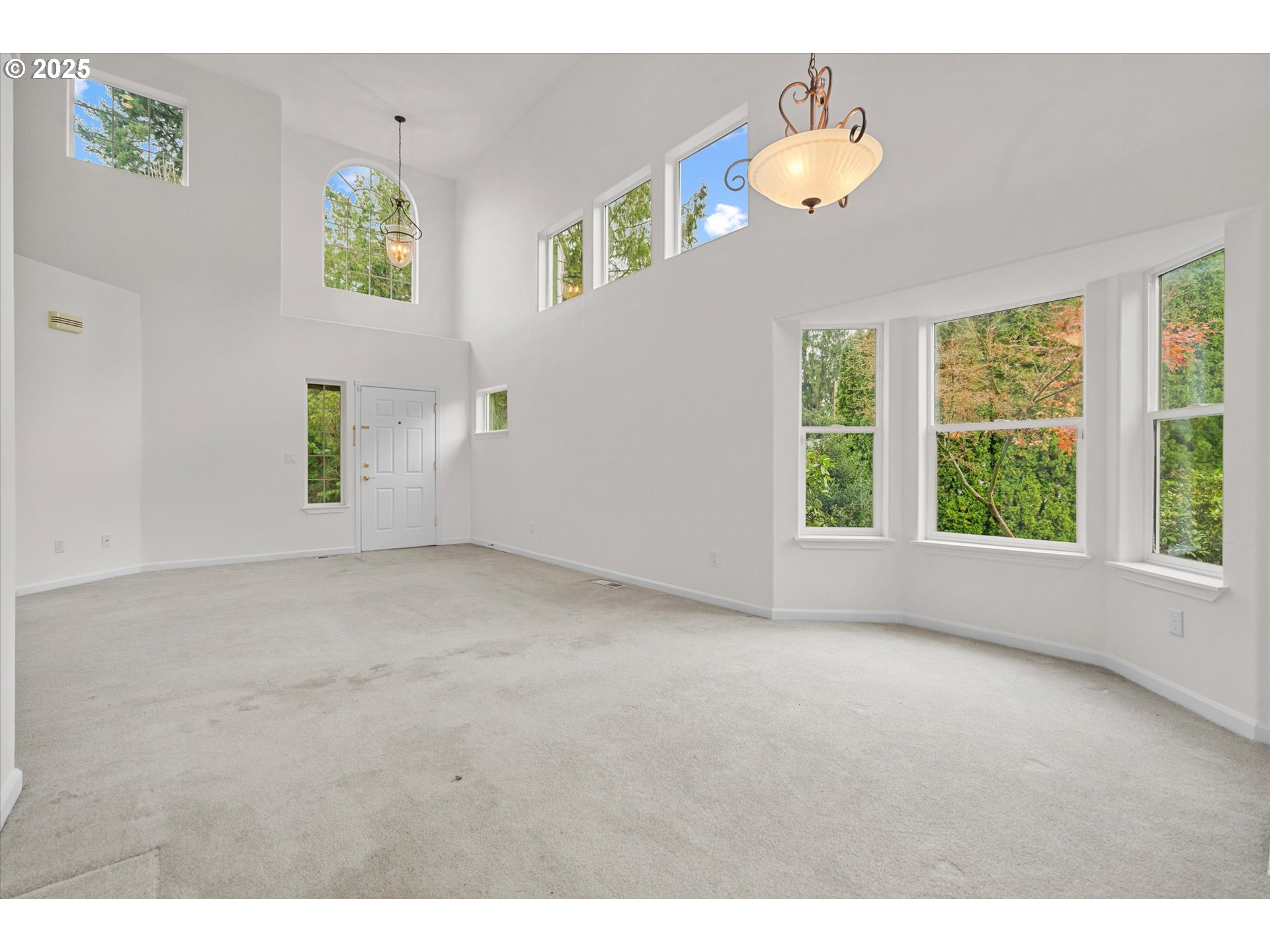 12262 Southwest 114th Terrace Portland, OR 97223 - Photo 10 of 41 a view of an empty room with a window