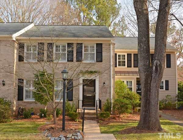 3002 Wycliff Road Raleigh, NC 27607 - Photo 1 of 21 a front view of a house with a yard