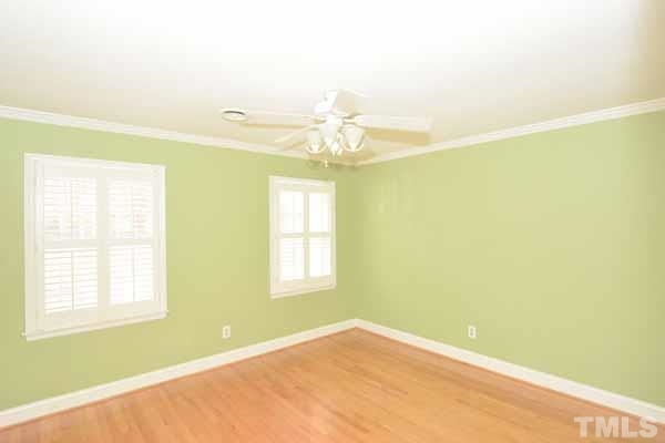 3002 Wycliff Road Raleigh, NC 27607 - Photo 12 of 21 a view of a big room with windows and chandelier fan