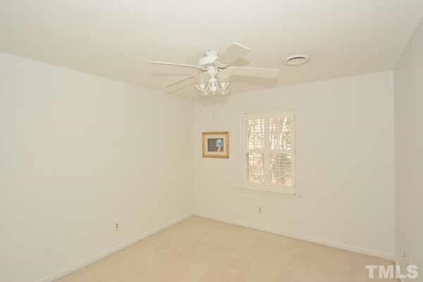 3002 Wycliff Road Raleigh, NC 27607 - Photo 13 of 21 an empty room with windows and fan