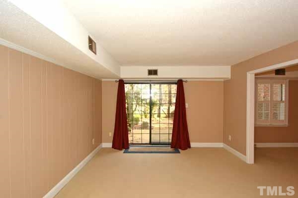 3002 Wycliff Road Raleigh, NC 27607 - Photo 16 of 21 an empty room with windows
