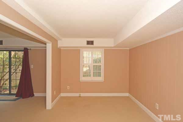 3002 Wycliff Road Raleigh, NC 27607 - Photo 20 of 21 an empty room with windows