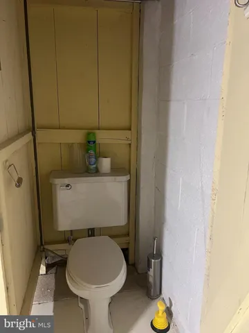 a bathroom with a toilet and a sink