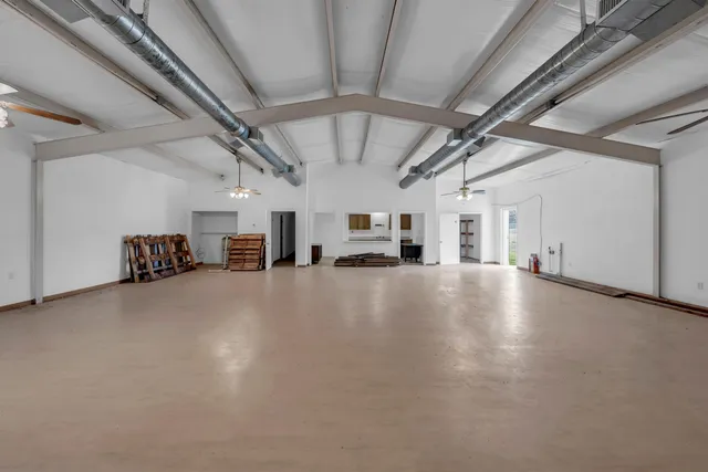 a view of a livingroom with a flat screen tv