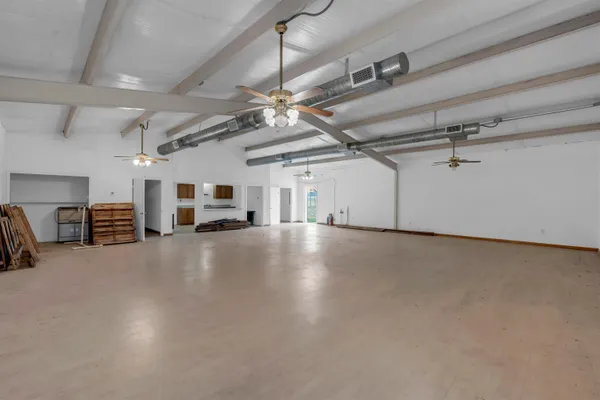 an aerial view of a house with a ocean view