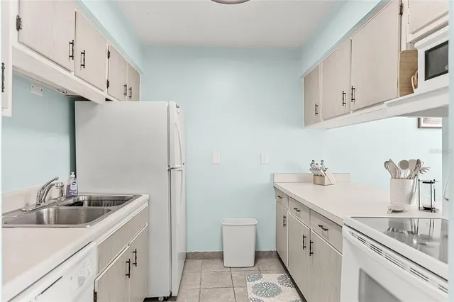 a utility room with cabinets