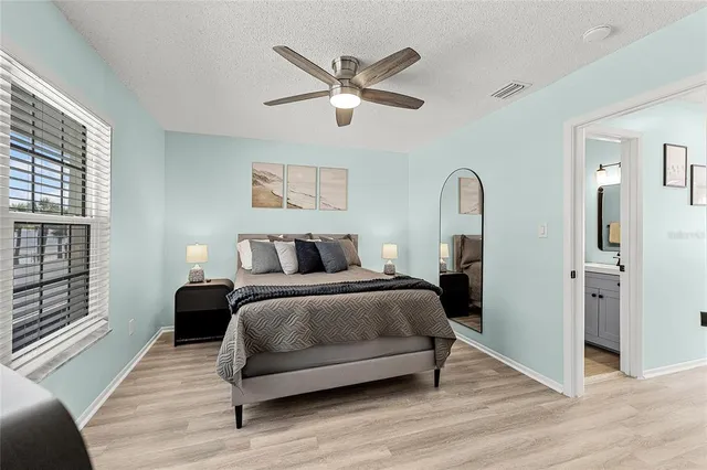 a balcony with table and chairs