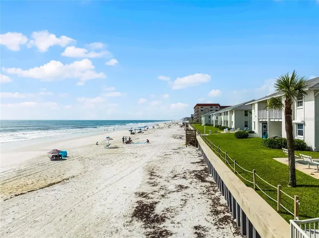 a view of a city with an ocean