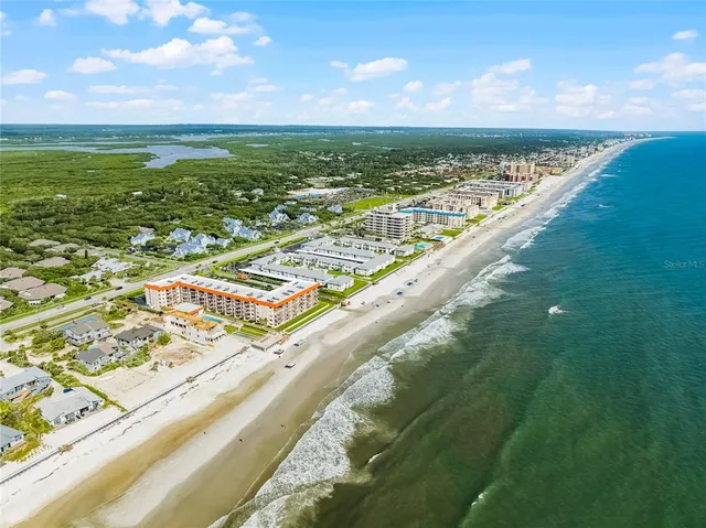 a view of a city with ocean